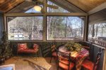 Screened master porch is great for morning coffee or quiet times